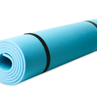 One blue gymnastic carpet isolated on white. concept sport.